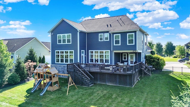 16711 Meadow Wood Dr, Noblesville, IN 46062 - back of property with stairway, a playground, and a deck