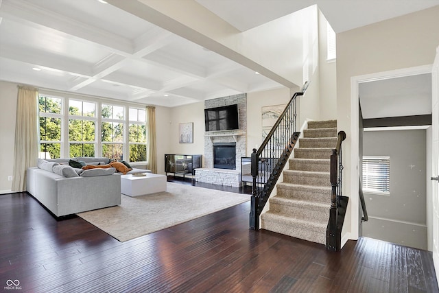 16711 Meadow Wood Dr, Noblesville, IN 46062 - living area featuring a fireplace, stairway, dark wood-type flooring, beam ceiling, and coffered ceiling