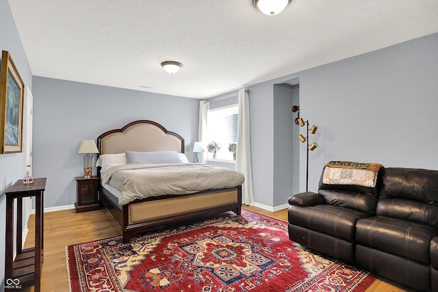 16711 Meadow Wood Dr, Noblesville, IN 46062 - bedroom featuring light wood-type flooring and baseboards
