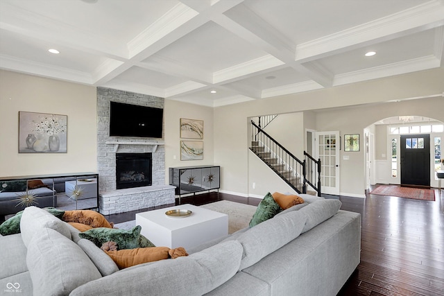 16711 Meadow Wood Dr, Noblesville, IN 46062 - living room with stairway, beamed ceiling, coffered ceiling, dark wood-style flooring, and crown molding