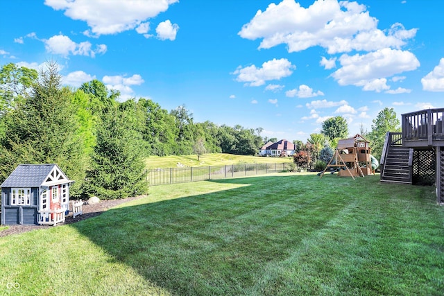 16711 Meadow Wood Dr, Noblesville, IN 46062 - fenced backyard featuring stairway, a playground, a wooden deck, and an outdoor structure