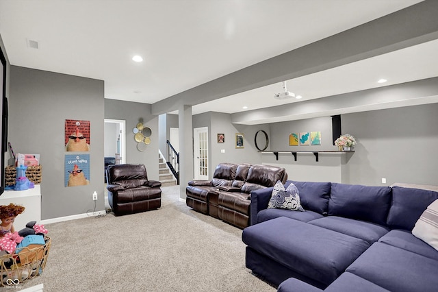 16711 Meadow Wood Dr, Noblesville, IN 46062 - carpeted living area with stairway and recessed lighting