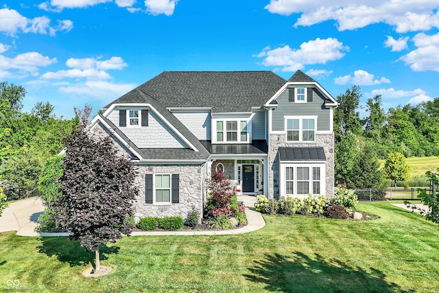 16711 Meadow Wood Dr, Noblesville, IN 46062 - view of front of house featuring stone siding and roof with shingles