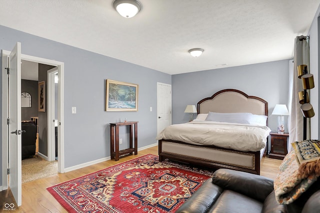 16711 Meadow Wood Dr, Noblesville, IN 46062 - bedroom featuring light wood-type flooring and baseboards