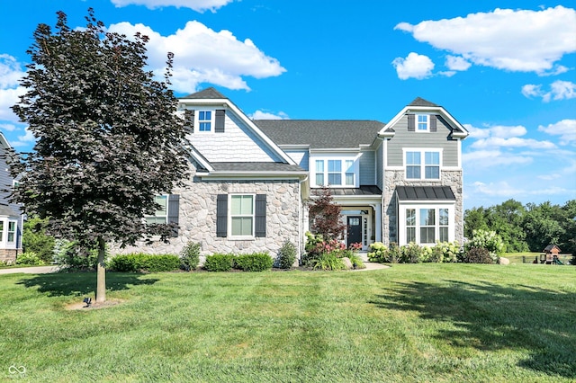 16711 Meadow Wood Dr, Noblesville, IN 46062 - craftsman house with stone siding, a front lawn, and a shingled roof