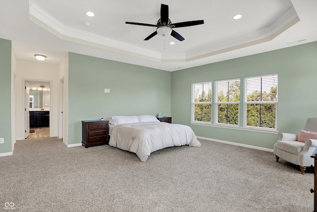 16711 Meadow Wood Dr, Noblesville, IN 46062 - carpeted bedroom with a tray ceiling, ornamental molding, recessed lighting, a ceiling fan, and ensuite bath