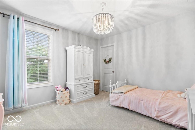 5542 Pennycress Dr, Noblesville, IN 46062 - bedroom with light colored carpet and a chandelier