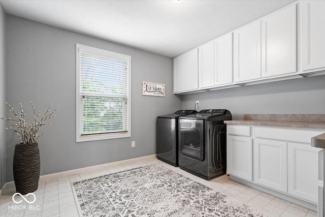5542 Pennycress Dr, Noblesville, IN 46062 - laundry area featuring cabinet space and washing machine and dryer