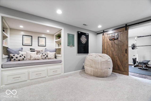 5542 Pennycress Dr, Noblesville, IN 46062 - living area featuring a barn door, recessed lighting, and carpet