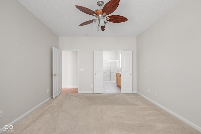 13019 Pinner Ave, Fishers, IN 46037 - unfurnished bedroom with light carpet, ensuite bathroom, and ceiling fan