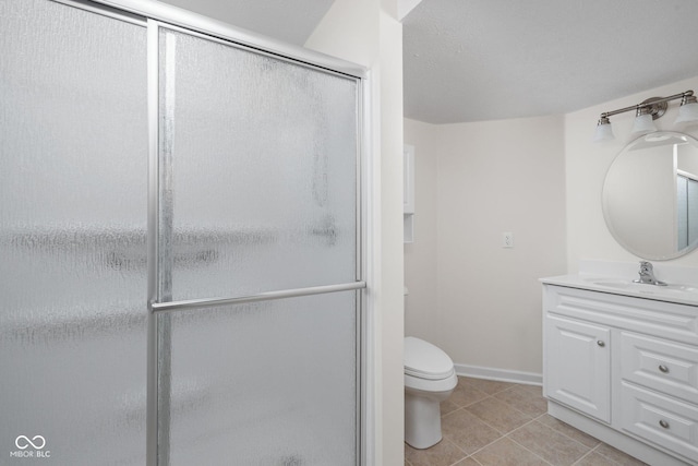 13019 Pinner Ave, Fishers, IN 46037 - full bathroom with vanity, a shower stall, and tile patterned flooring