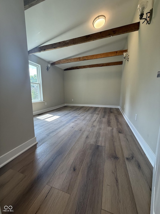 131 S Beatty St, Columbus, IN 47201 - empty room featuring beamed ceiling and dark wood-style floors