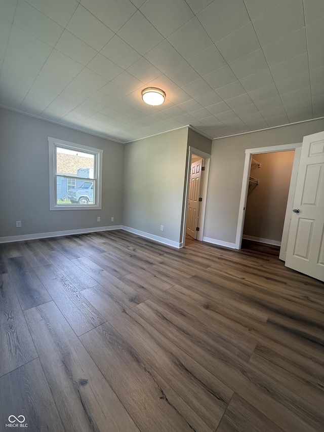 131 S Beatty St, Columbus, IN 47201 - unfurnished room with dark wood-style flooring and baseboards