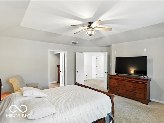 4233 Dartmoor Dr, Greenwood, IN 46143 - bedroom featuring light carpet and ceiling fan