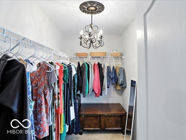 4233 Dartmoor Dr, Greenwood, IN 46143 - spacious closet featuring a chandelier and carpet