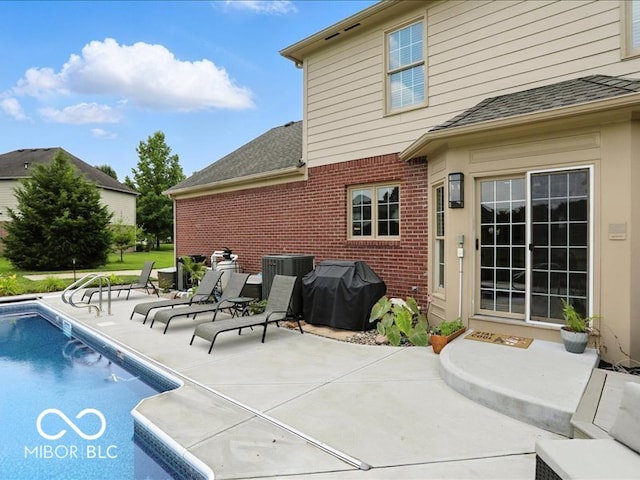 4233 Dartmoor Dr, Greenwood, IN 46143 - outdoor pool featuring grilling area and a patio area