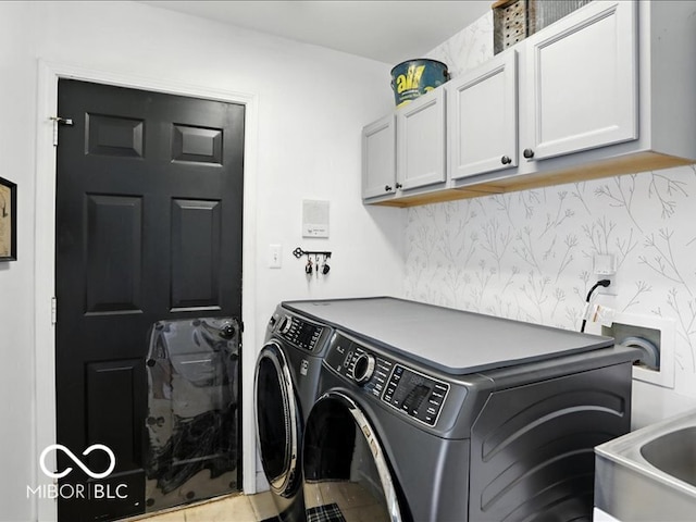 4233 Dartmoor Dr, Greenwood, IN 46143 - washroom featuring cabinet space and washing machine and clothes dryer