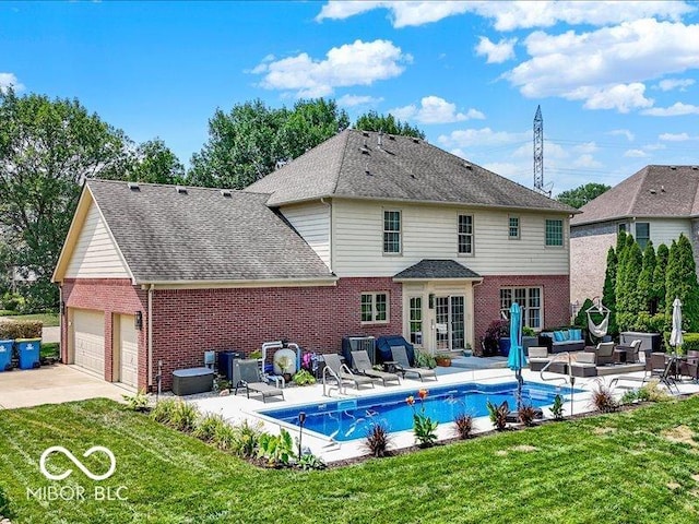 4233 Dartmoor Dr, Greenwood, IN 46143 - rear view of property featuring brick siding, an outdoor living space, a patio, and a lawn