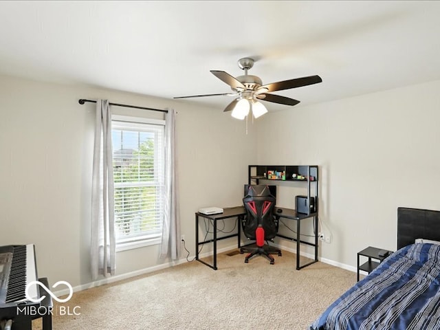 4233 Dartmoor Dr, Greenwood, IN 46143 - carpeted bedroom with baseboards and ceiling fan