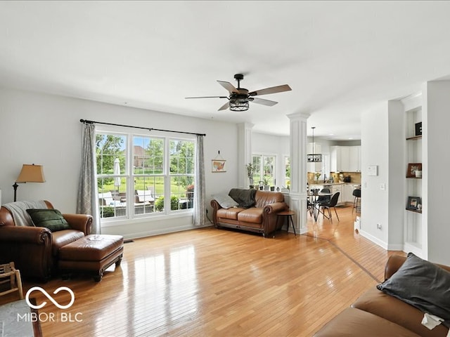 4233 Dartmoor Dr, Greenwood, IN 46143 - living room featuring light wood-style flooring and ceiling fan