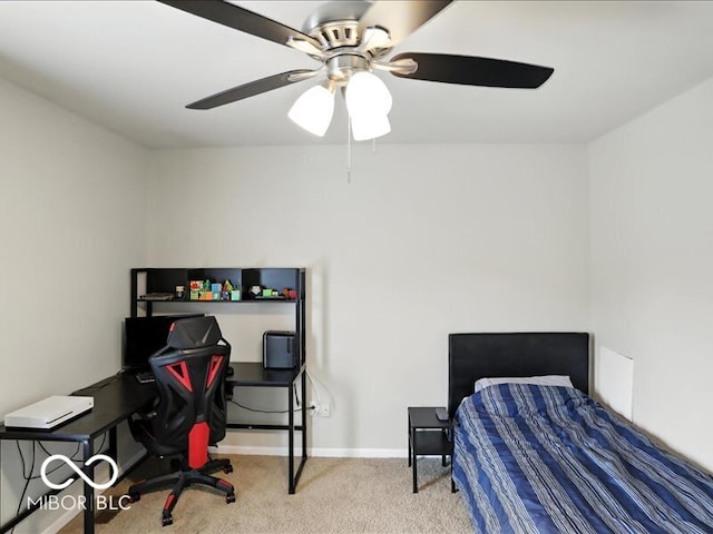 4233 Dartmoor Dr, Greenwood, IN 46143 - carpeted bedroom featuring a ceiling fan and baseboards
