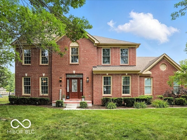 4233 Dartmoor Dr, Greenwood, IN 46143 - view of front of property with brick siding and a shingled roof