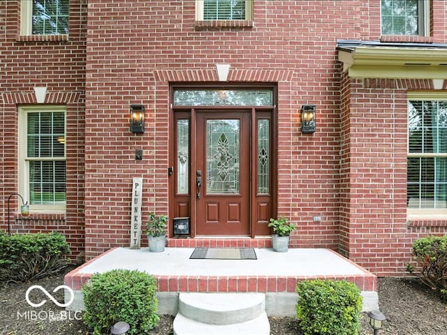 4233 Dartmoor Dr, Greenwood, IN 46143 - entrance to property with brick siding