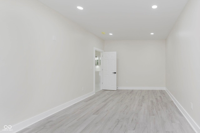 2125 N Pasadena St, Indianapolis, IN 46219 - spare room featuring light wood finished floors and recessed lighting