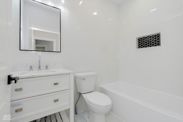 2125 N Pasadena St, Indianapolis, IN 46219 - bathroom with vanity, tile walls, and shower / tub combination