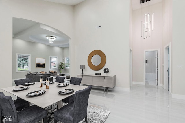 2125 N Pasadena St, Indianapolis, IN 46219 - dining area with a towering ceiling and arched walkways