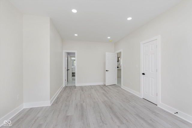 2125 N Pasadena St, Indianapolis, IN 46219 - spare room with light wood finished floors and recessed lighting