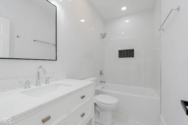 2125 N Pasadena St, Indianapolis, IN 46219 - bathroom featuring vanity, shower / bathtub combination, and tile walls
