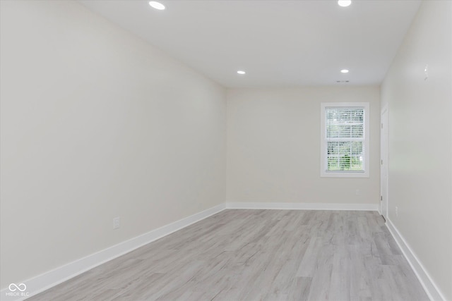 2125 N Pasadena St, Indianapolis, IN 46219 - spare room with recessed lighting and light wood finished floors