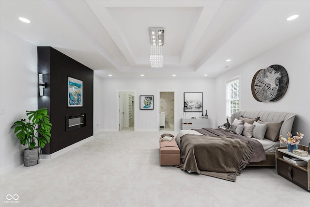 2125 N Pasadena St, Indianapolis, IN 46219 - bedroom with recessed lighting, light carpet, a tray ceiling, and ensuite bathroom