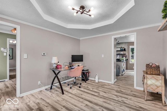 7502 Colony Cir, Indianapolis, IN 46260 - office area with wood finished floors, a textured ceiling, a raised ceiling, a chandelier, and crown molding