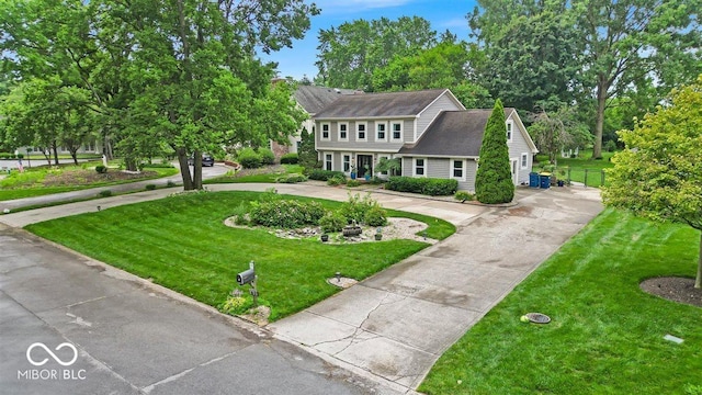7502 Colony Cir, Indianapolis, IN 46260 - colonial home featuring concrete driveway