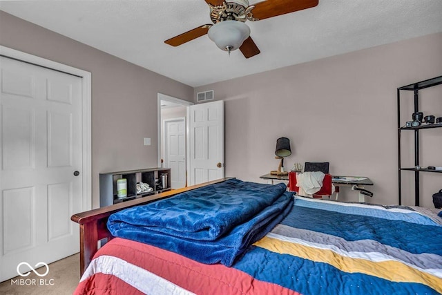 7502 Colony Cir, Indianapolis, IN 46260 - bedroom with carpet and a ceiling fan