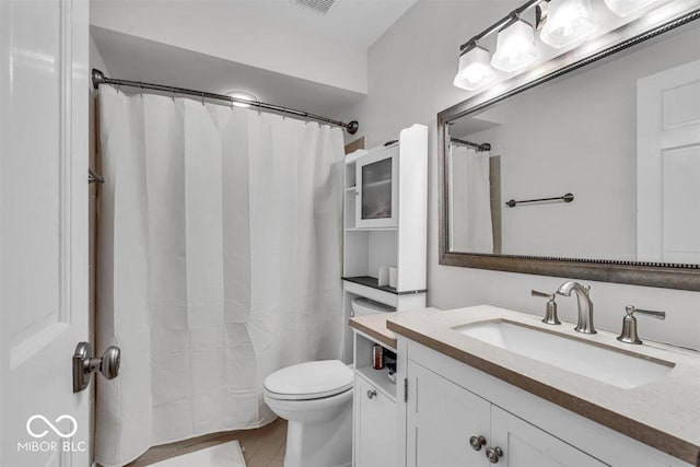 7502 Colony Cir, Indianapolis, IN 46260 - bathroom with vanity, tile patterned flooring, and curtained shower