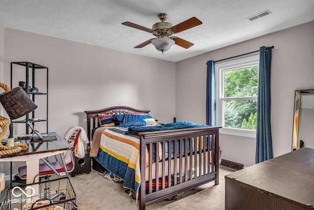 7502 Colony Cir, Indianapolis, IN 46260 - bedroom with carpet floors, a textured ceiling, and ceiling fan