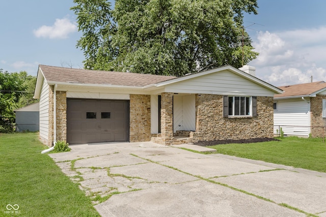 5134 Rinehart Ave, Indianapolis, IN 46241 - view of front of property with concrete driveway, stone siding, an attached garage, and a front yard