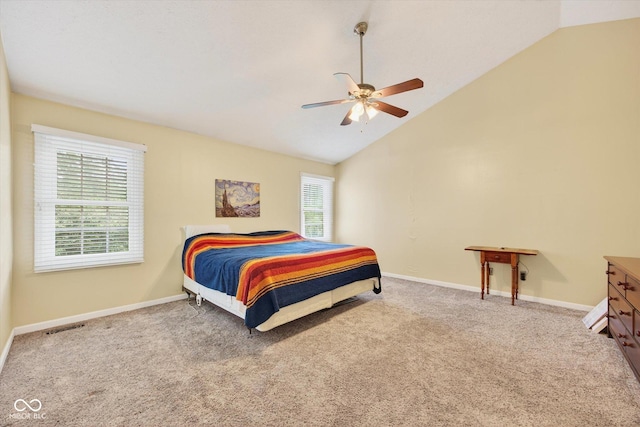 13470 Shakamac Dr, Carmel, IN 46032 - bedroom featuring multiple windows, lofted ceiling, carpet flooring, and a ceiling fan