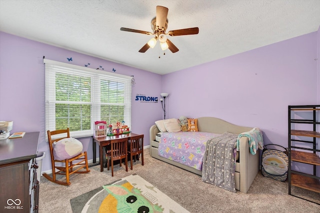 13470 Shakamac Dr, Carmel, IN 46032 - carpeted bedroom featuring a textured ceiling and ceiling fan