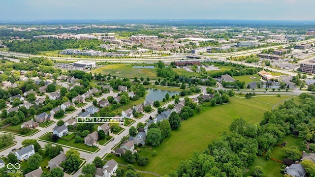 13470 Shakamac Dr, Carmel, IN 46032 - bird's eye view of a tree filled landscape and a nearby body of water