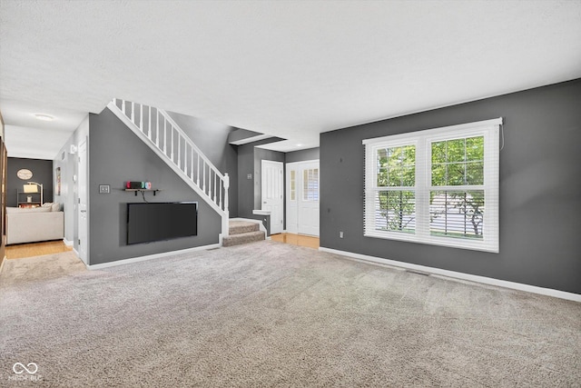 13470 Shakamac Dr, Carmel, IN 46032 - unfurnished living room featuring carpet and stairs