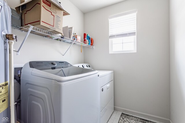6902 Diamondleaf Way, Brownsburg, IN 46112 - washroom with washer and dryer and baseboards