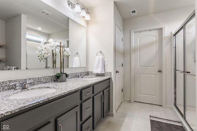 6902 Diamondleaf Way, Brownsburg, IN 46112 - bathroom with double vanity and a stall shower