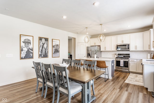 6902 Diamondleaf Way, Brownsburg, IN 46112 - dining area with light wood-style floors and recessed lighting