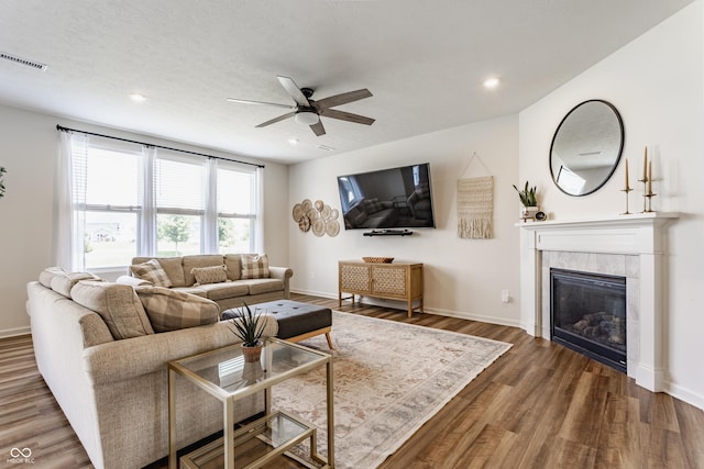 6902 Diamondleaf Way, Brownsburg, IN 46112 - living area with a ceiling fan, wood finished floors, a fireplace, and recessed lighting