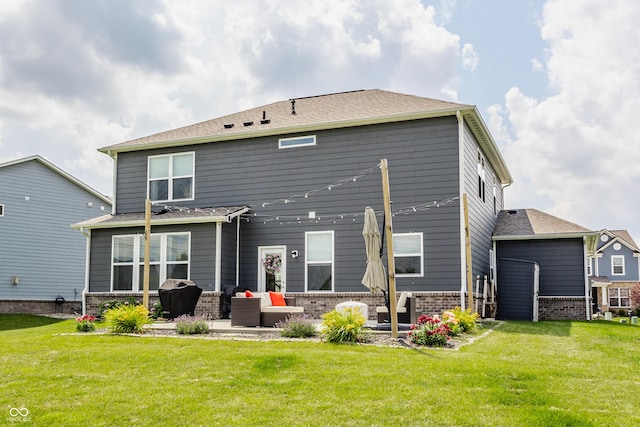 6902 Diamondleaf Way, Brownsburg, IN 46112 - back of property featuring a patio, a yard, and brick siding