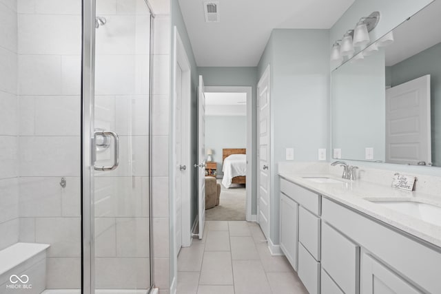 3969 Canning St, Danville, IN 46122 - ensuite bathroom with double vanity, a shower stall, and tile patterned floors